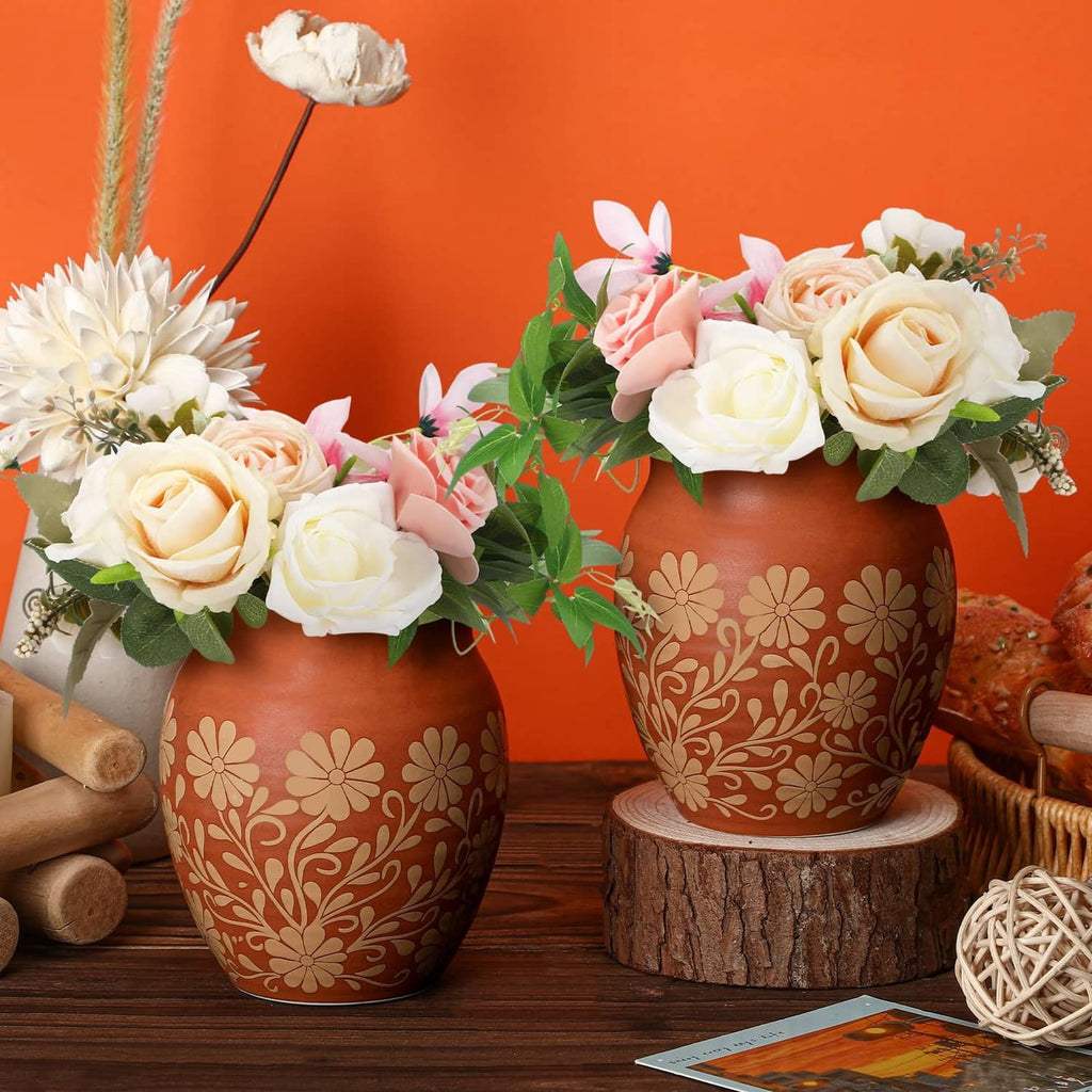 Set of 2 brown Mexican clay cantaritos with white flower pattern, roses in each cup