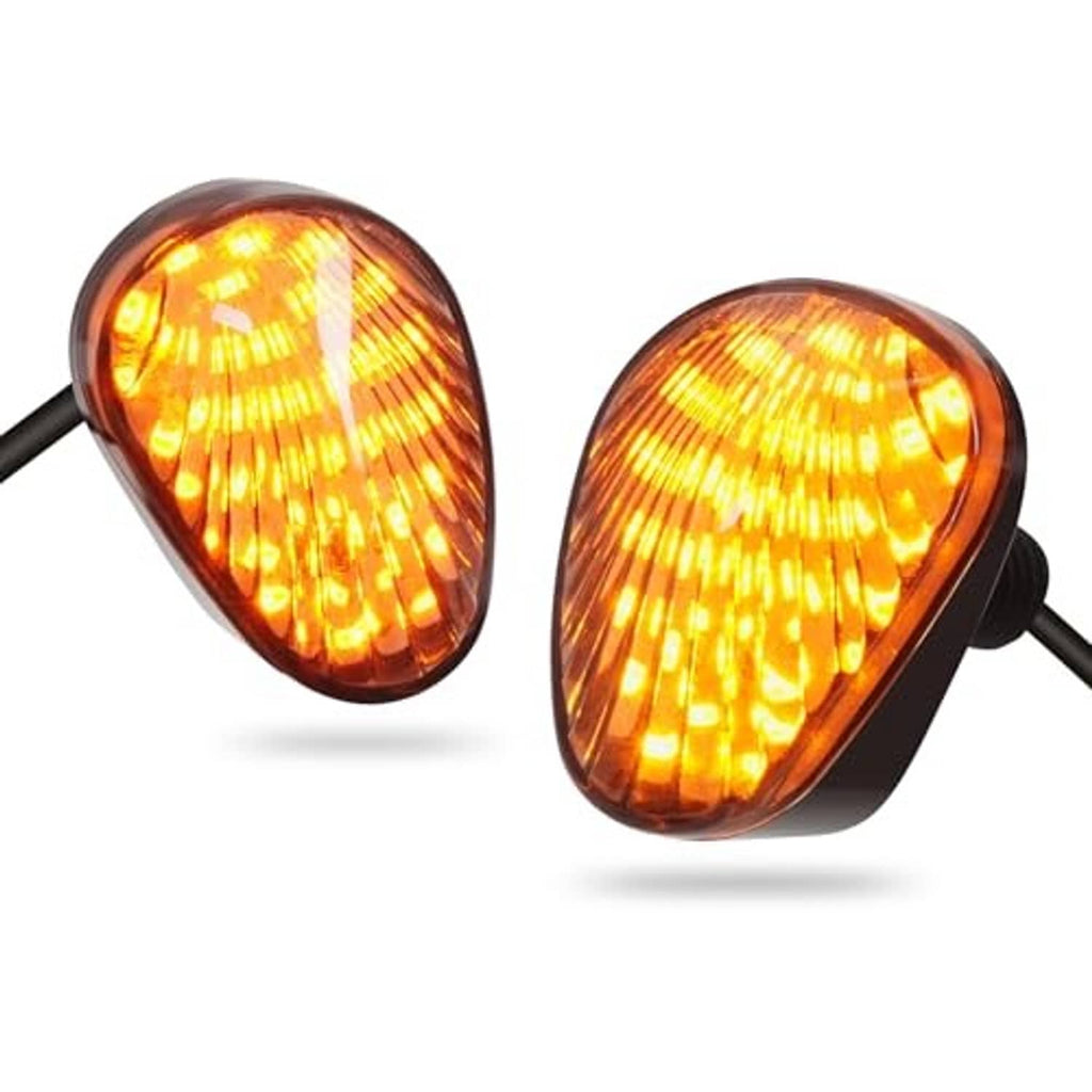 Pair of smoked oval LED turn signal lights with amber illumination and black side leads