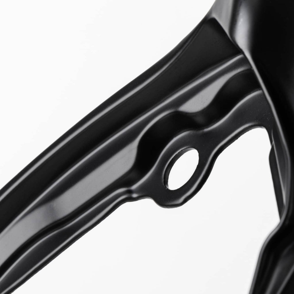 Black metal fairing bracket arm with two oval holes along the curved edge