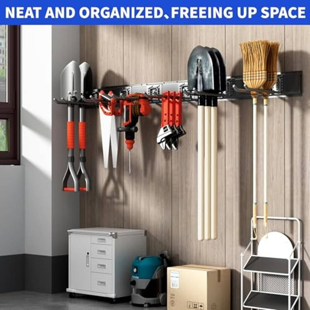 Tool storage wall rack with straight hooks holding garden tools and broom, black.