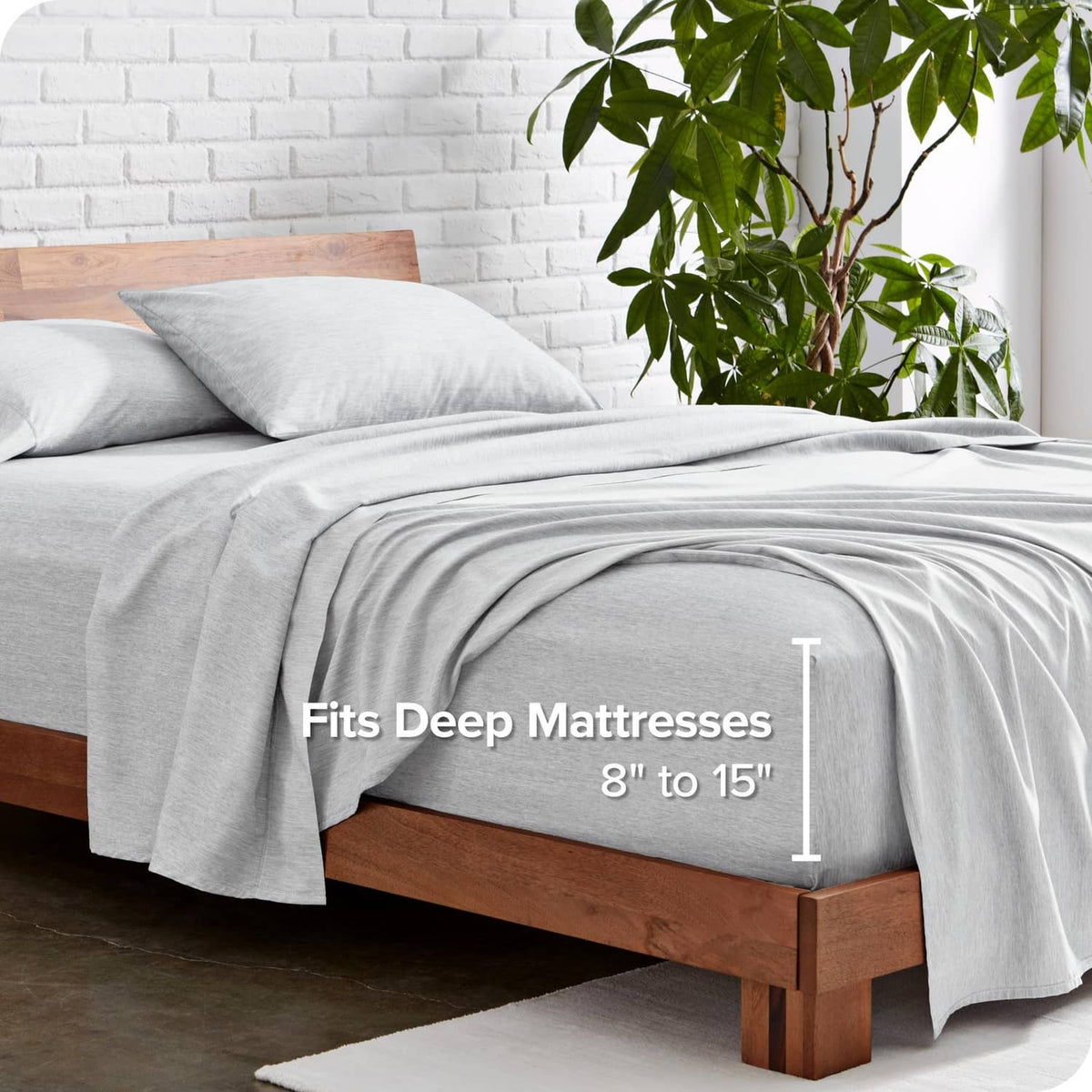 Heathered pewter sheet set on twin bed with deep-pocket fitted sheet and drape