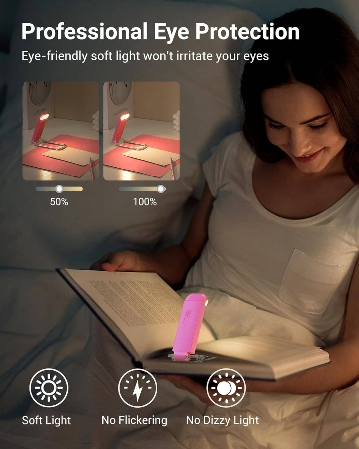 Pink clip-on LED reading light on an open book, warm white light for nighttime