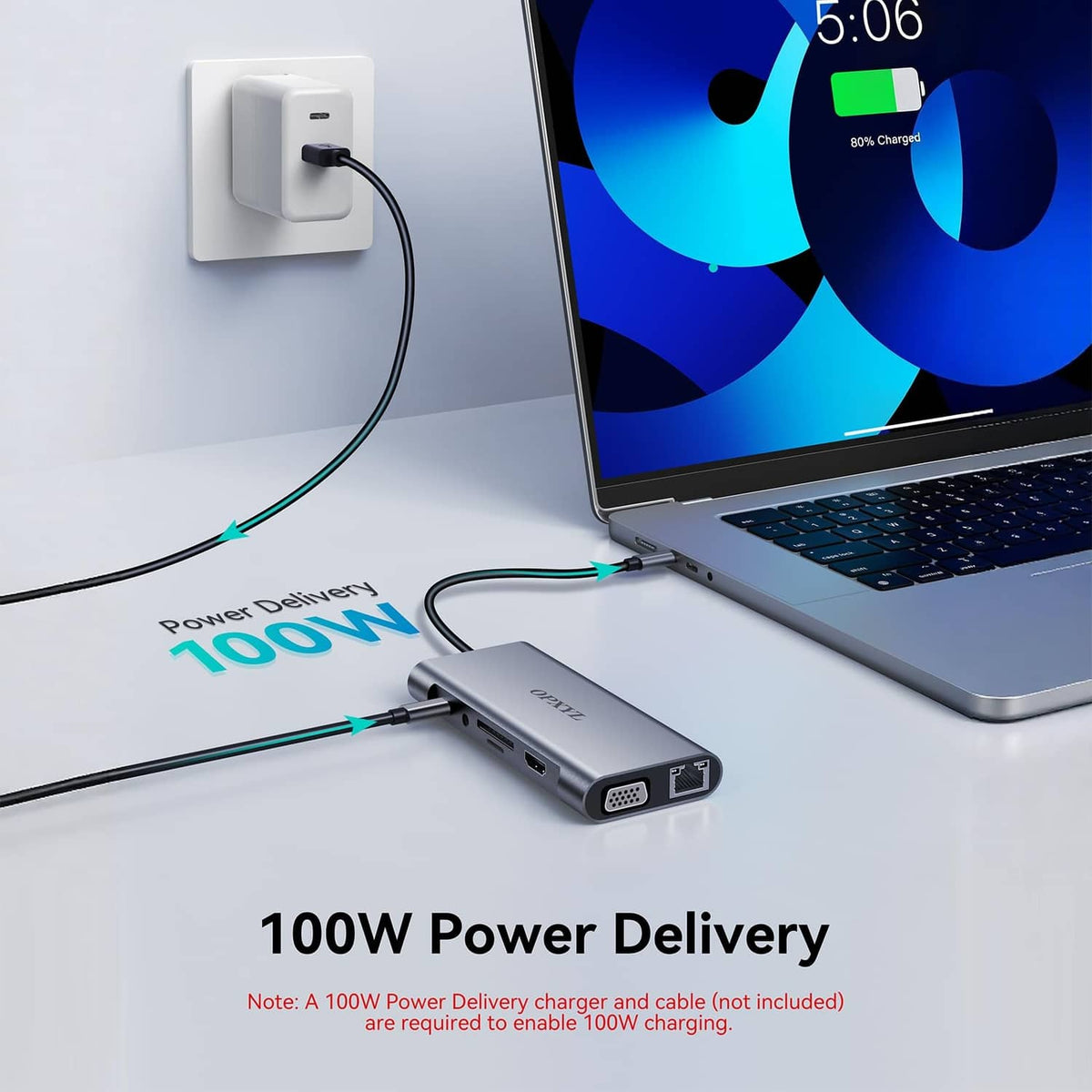Grey USB-C hub connected to a laptop with 100W power delivery passthrough