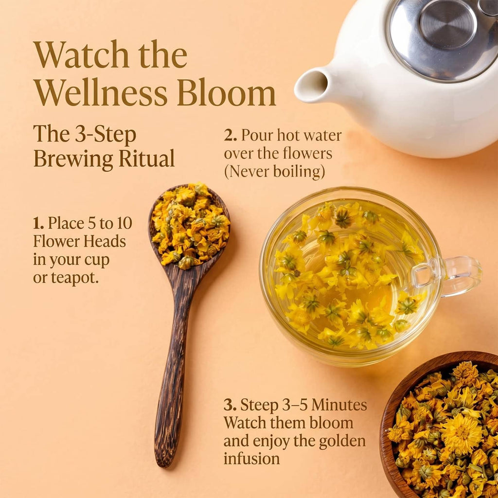 Chrysanthemum tea in glass cup with dried flower heads beside teapot