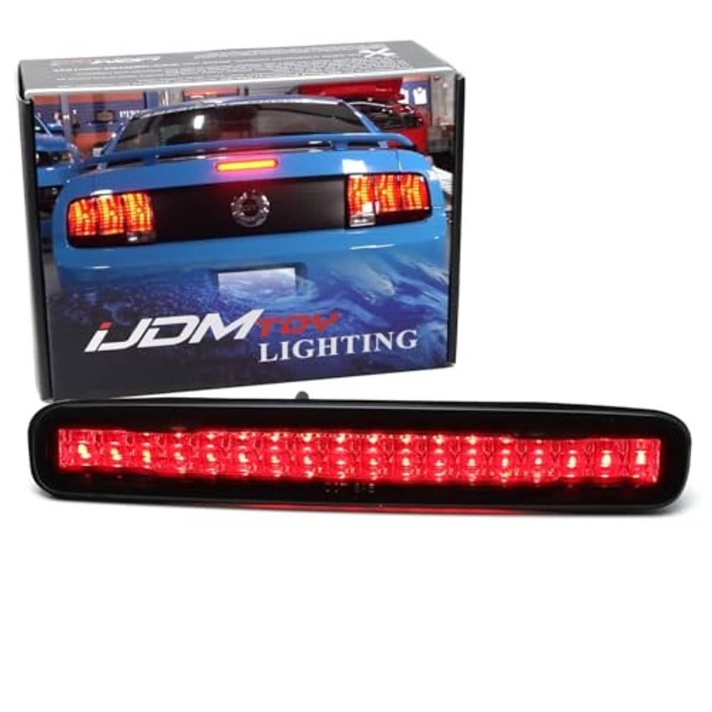 Smoked lens LED third brake light bar, fully illuminated red across the length