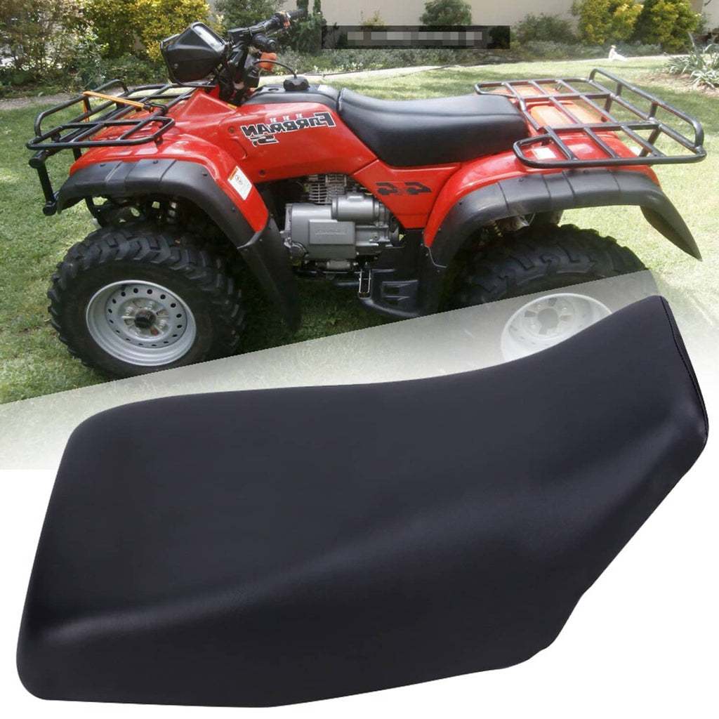 Black ATV seat cushion with smooth finish and front mounting hardware, side view.