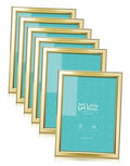 Gold picture frame set with teal backing, 5x7 style