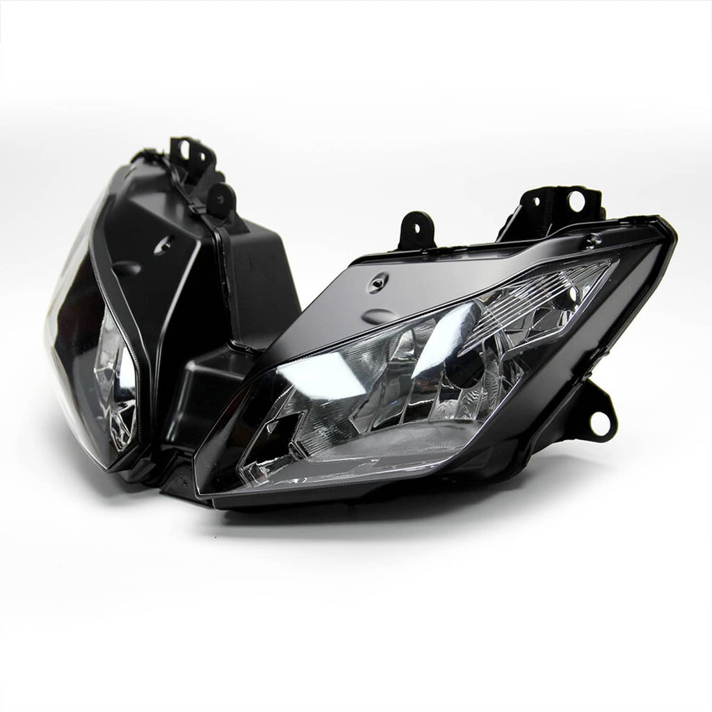 Front headlight lamp assembly with clear projector lens and black mounting brackets