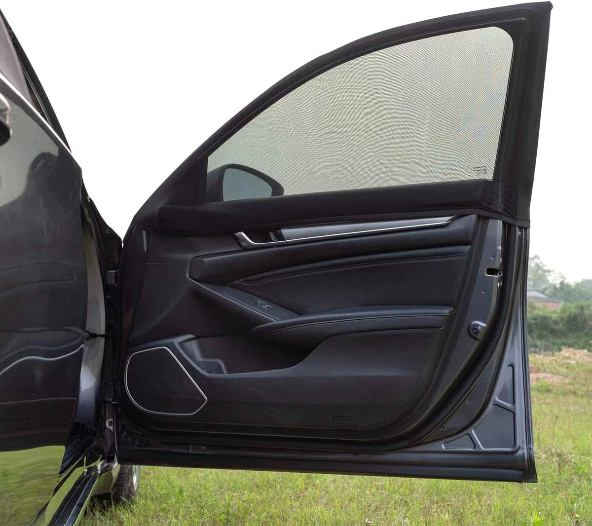 Black breathable car side window shade covering front door window, black mesh fabric