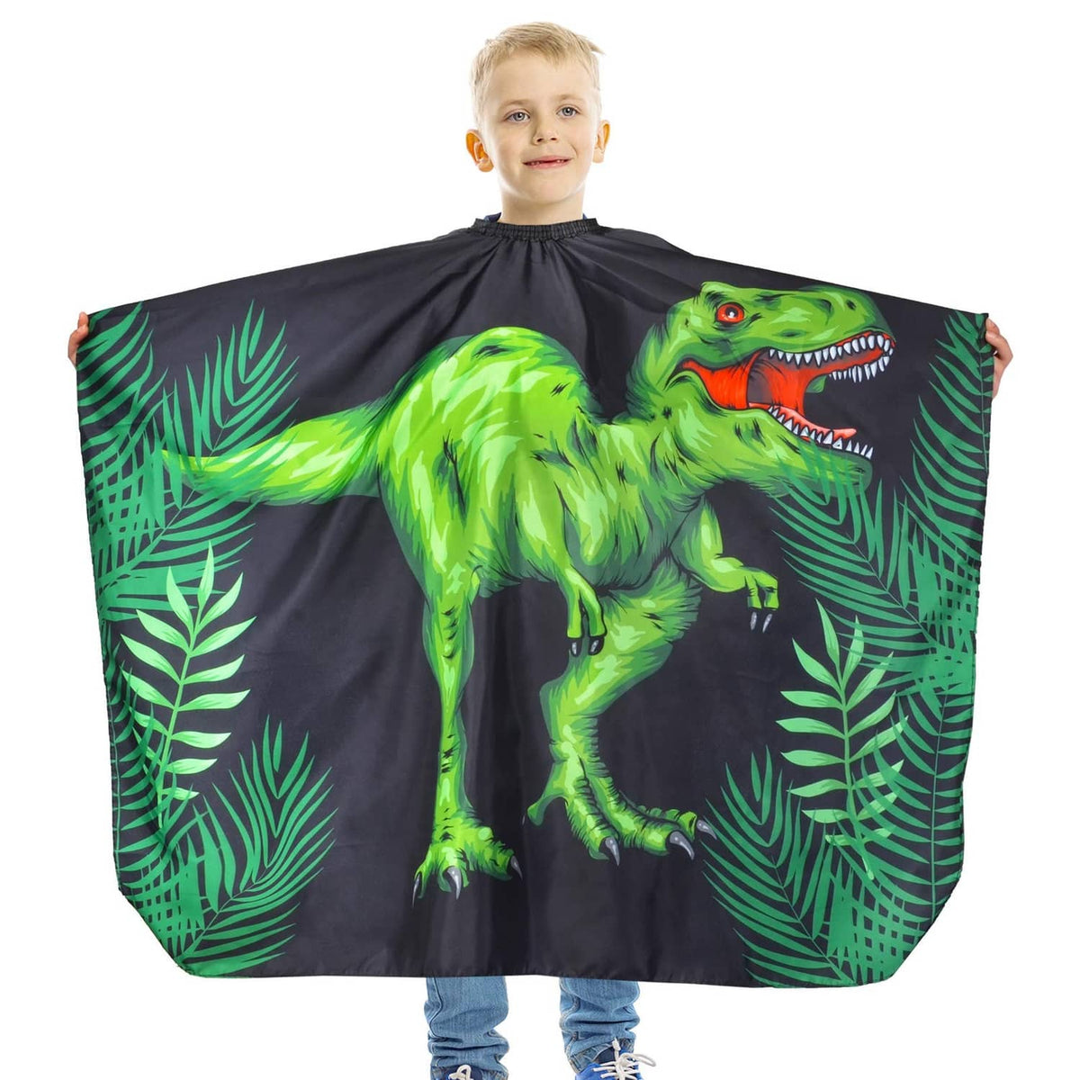 Kids waterproof haircut cape with green dinosaur graphic, black cape with ruffled neck