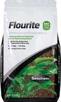 Aquarium substrate bag with white, black, and green planted-aquarium design