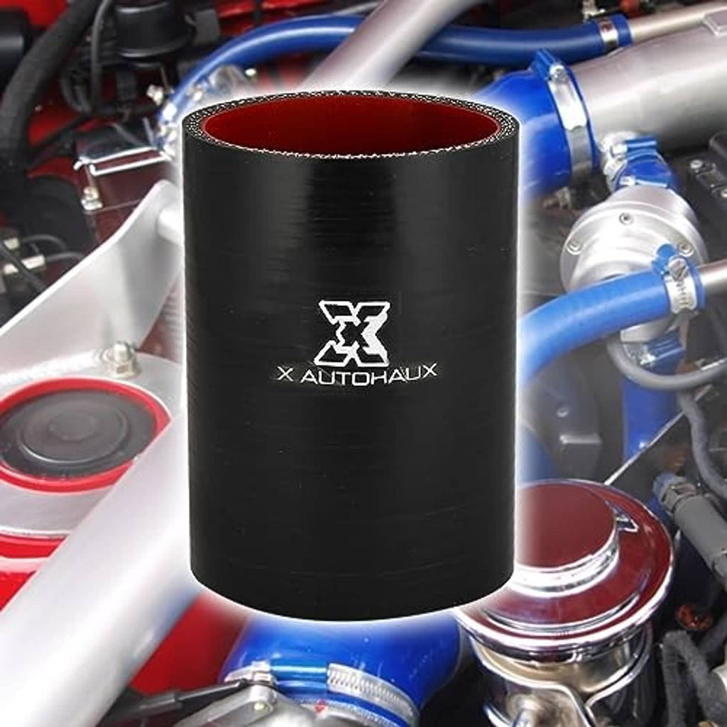 Black silicone hose coupler with red interior, installed near blue and silver metal piping