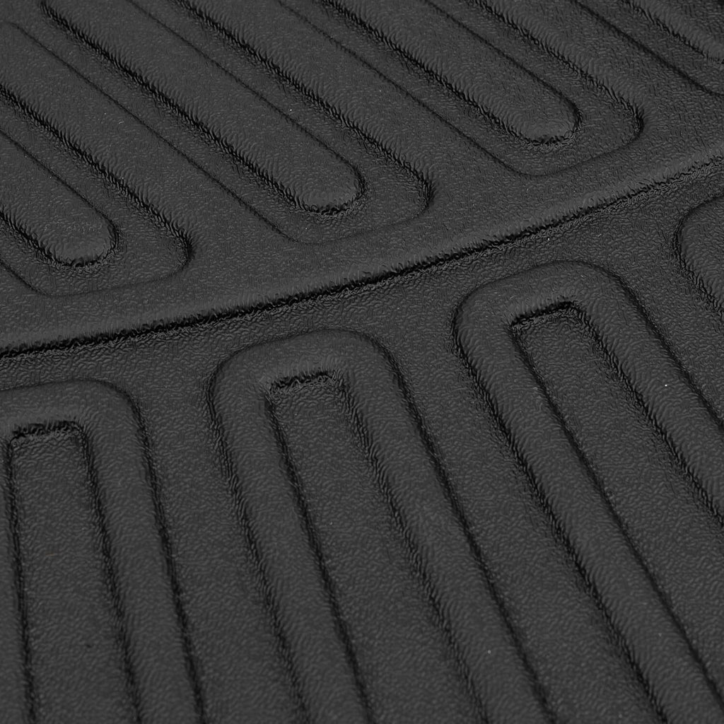 Black TPE rubber floor mat with raised grip ridges and channels