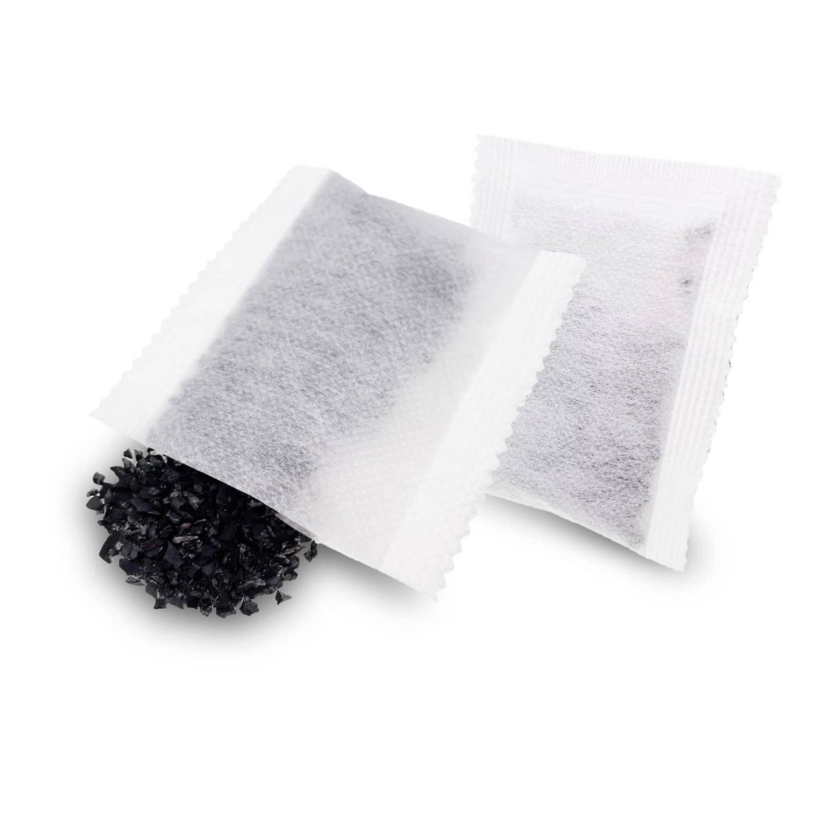 Activated charcoal distiller replacement pads, folded white sachets with grey charcoal