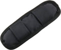 Black removable luggage shoulder strap pad, padded with stitched segments and textured fabric