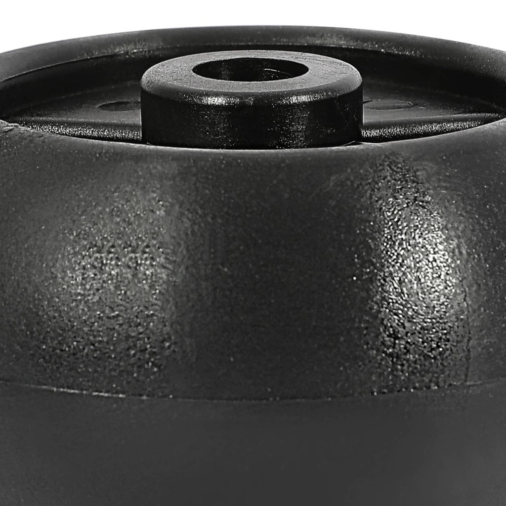 Close-up of black wheel top with circular mounting opening in raised hub