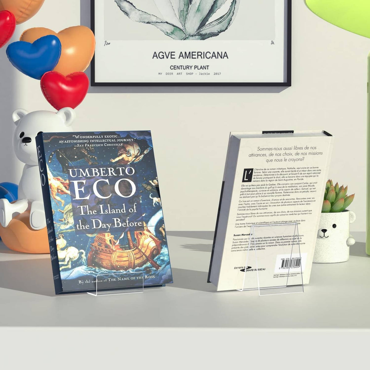 Clear acrylic book display stand holding a book with front shelf
