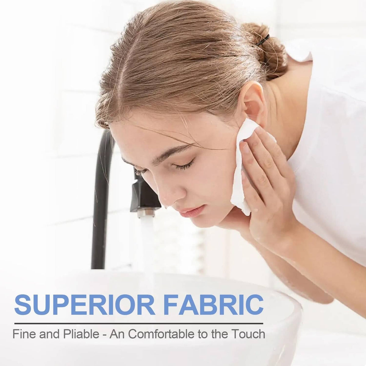 White compressed towel wiping a face, soft cloth texture visible