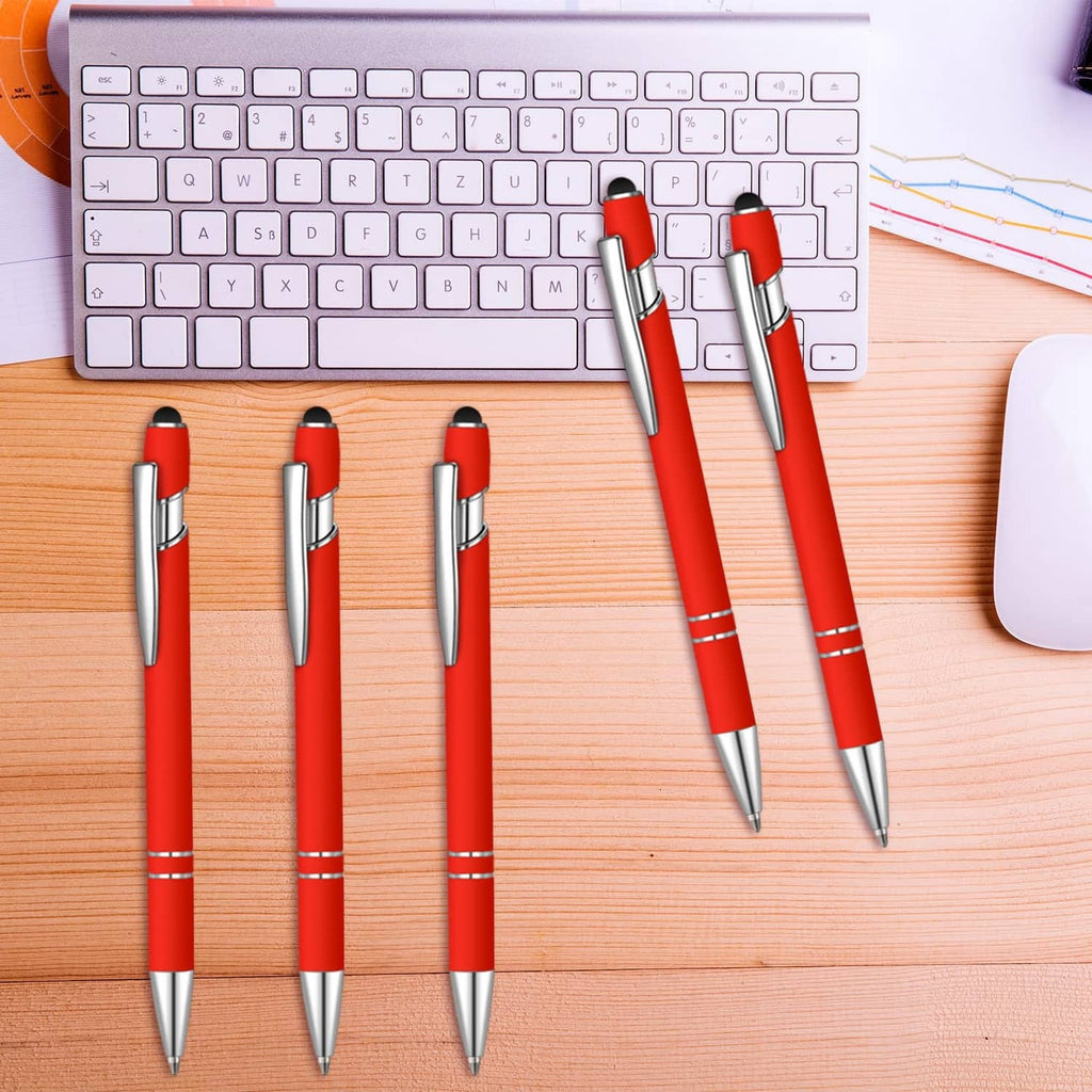 Red ballpoint pens set with silver barrels and black pen tips