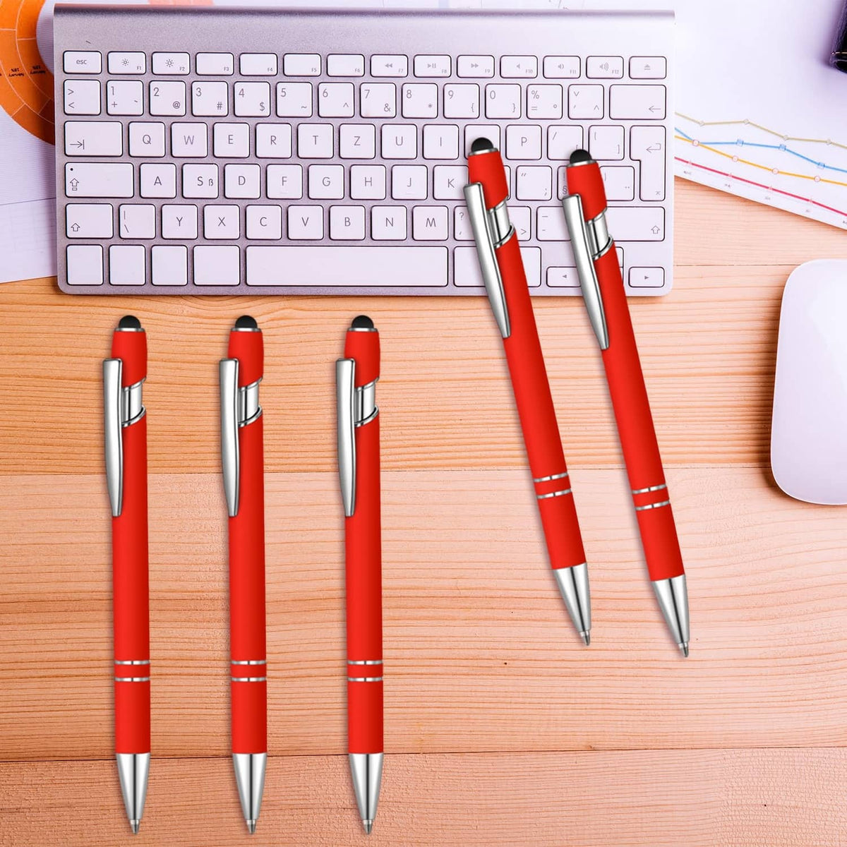 Red ballpoint pens set with silver barrels and black pen tips