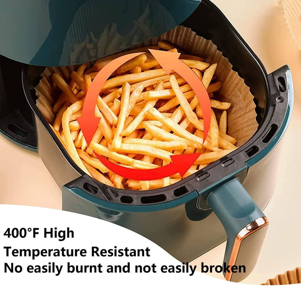 Round paper air fryer liner with fries in basket, heat-resistant disposable cup