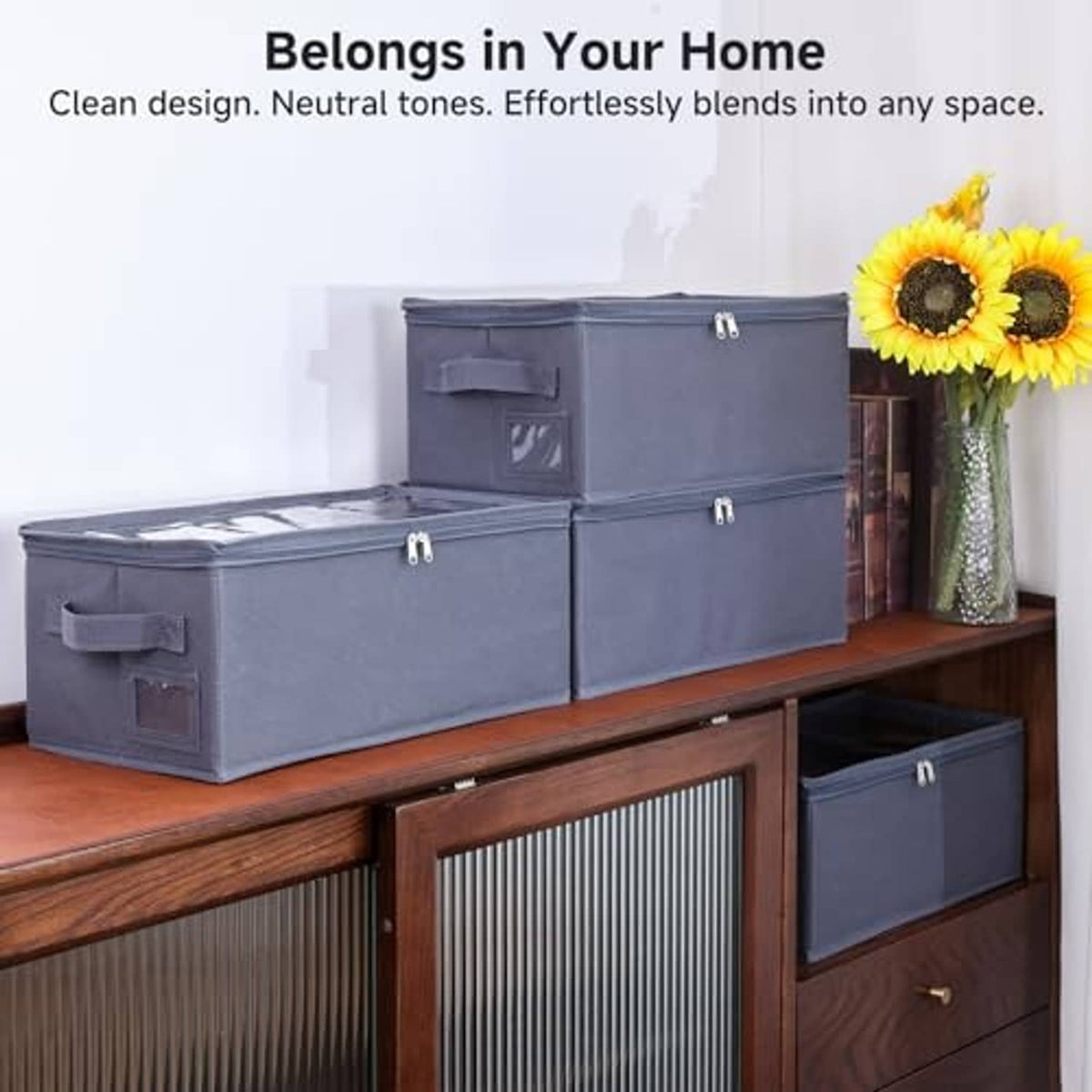 Gray fabric DVD storage box set with clear lids, metal zipper pulls, side handles
