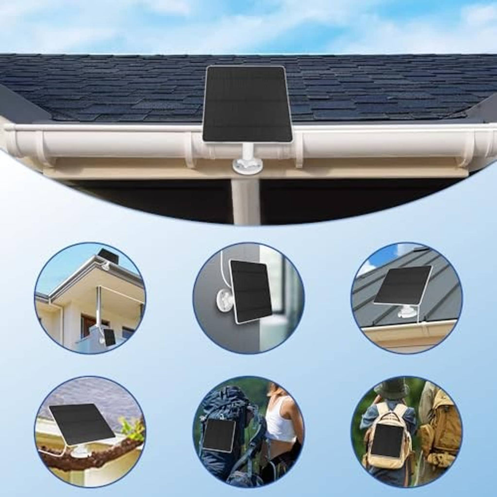 Solar panel charger mounted under a roof gutter with black panel and white spotlight mount