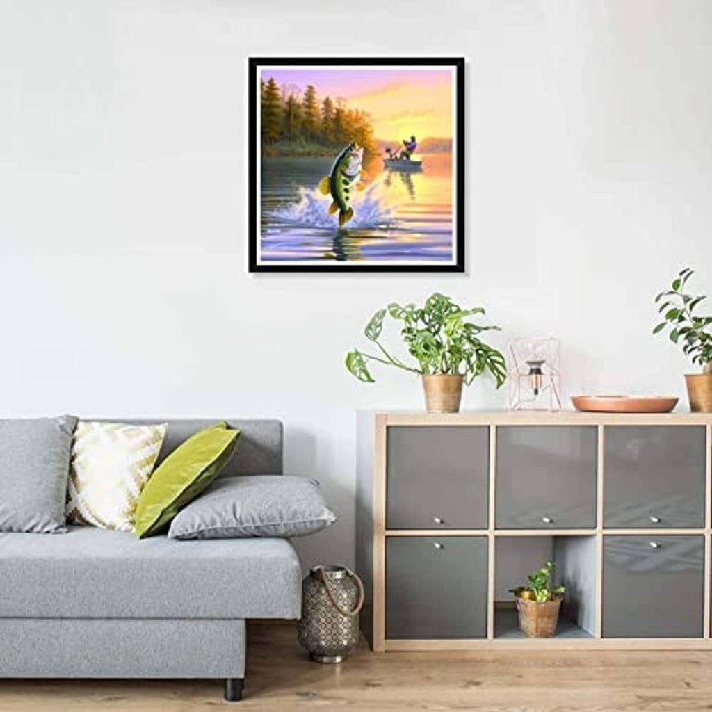 Framed diamond art canvas with fish in the water and a fisherman in the distance