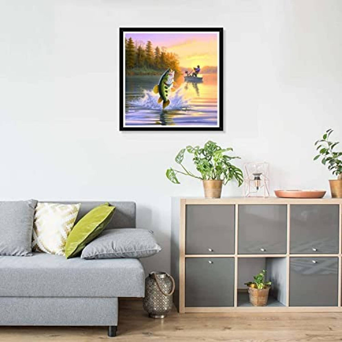 Framed diamond art canvas with fish in the water and a fisherman in the distance