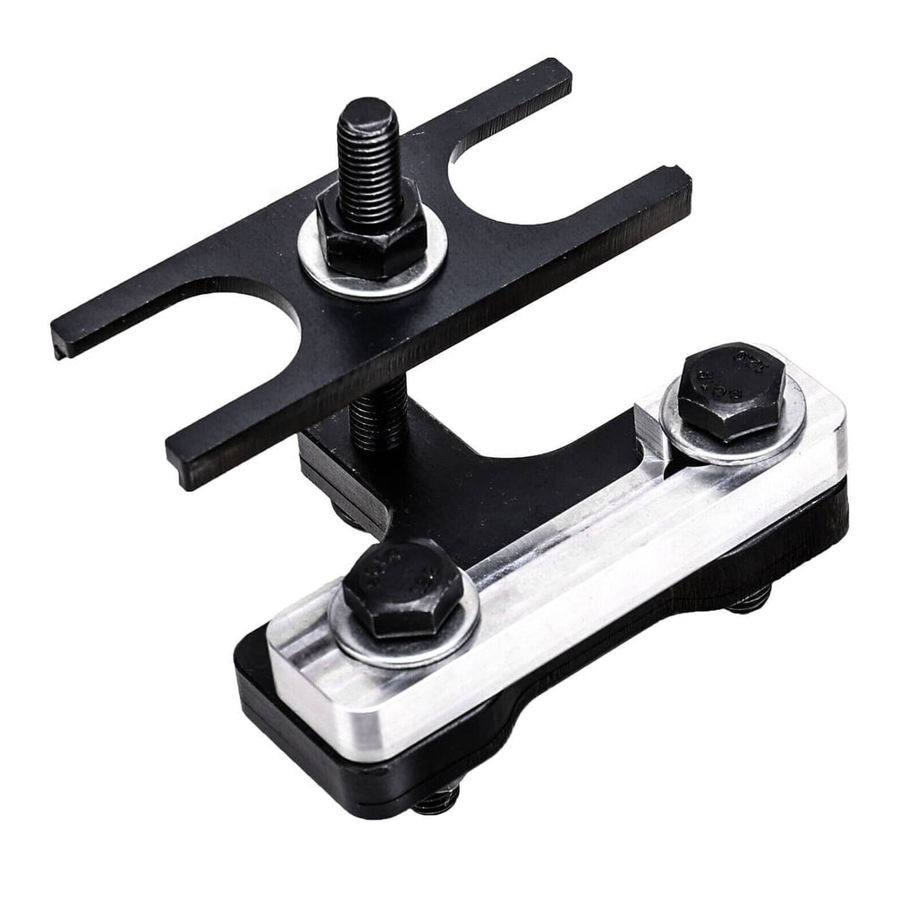 Black metal valve spring compressor tool with silver base and threaded clamp