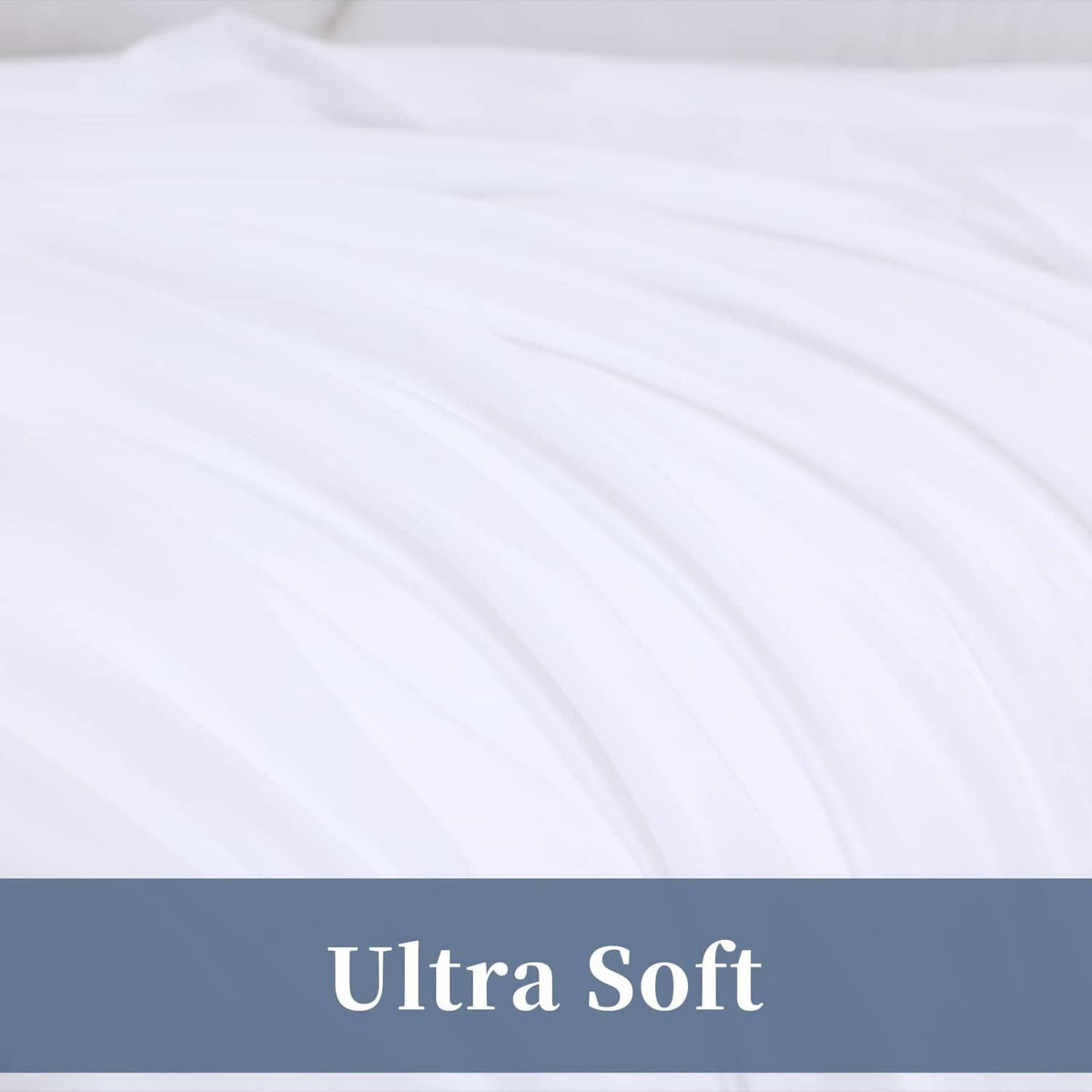 White flat sheet close-up showing smooth fabric with gathered folds