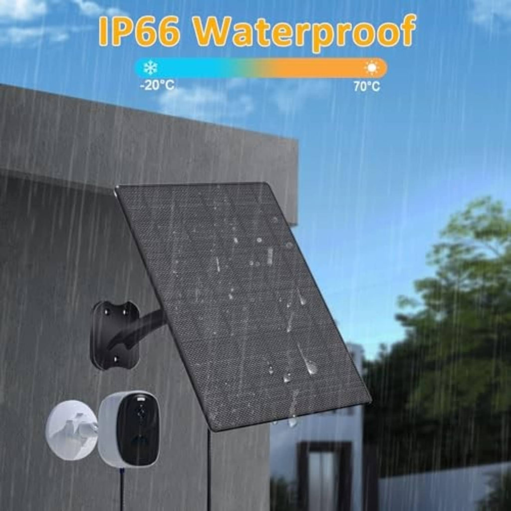 Dark gray solar panel mounted outdoors with droplets on the surface