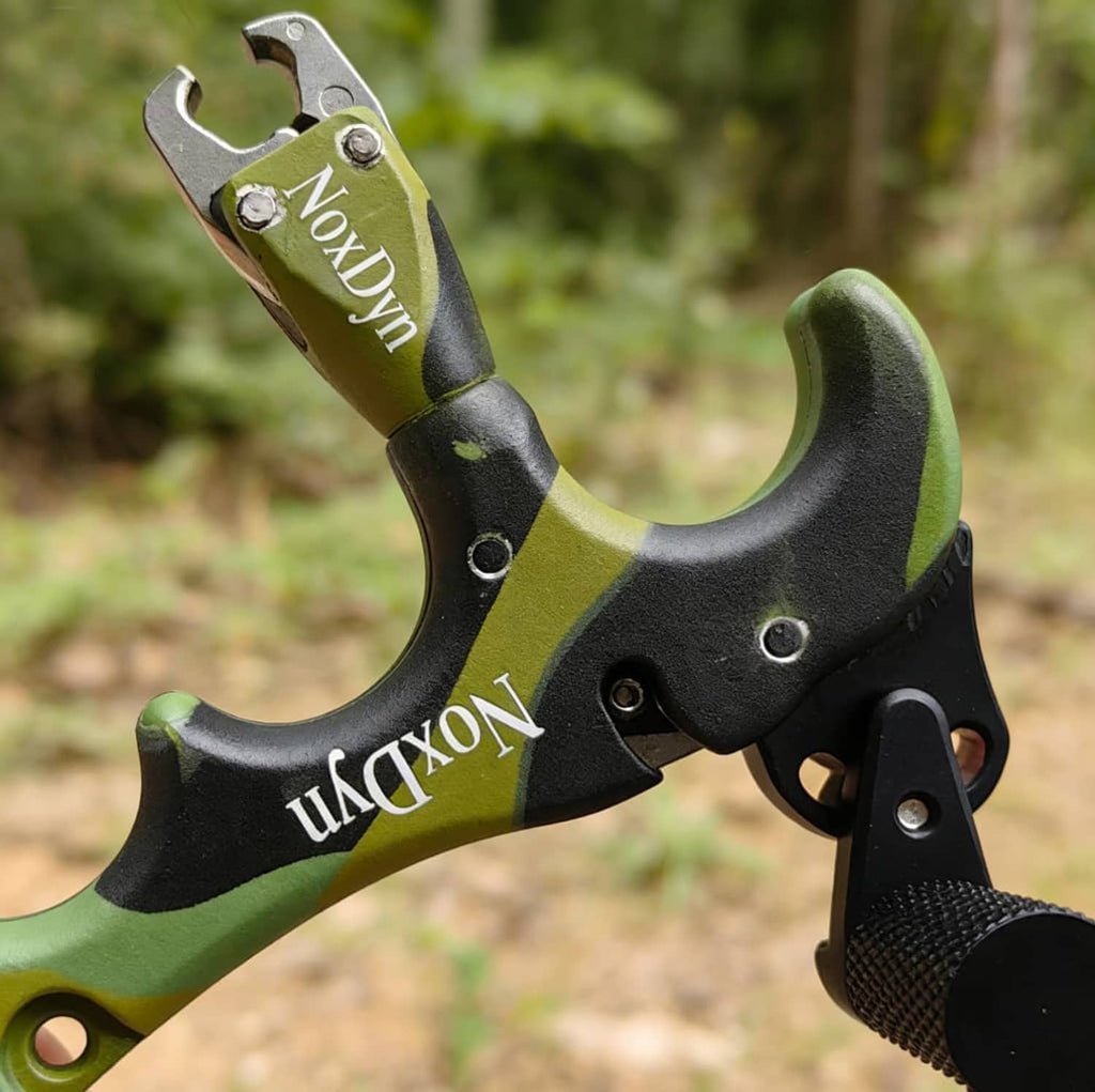Camo green/black thumb release with lanyard clip and metal release jaw, NoxDyn