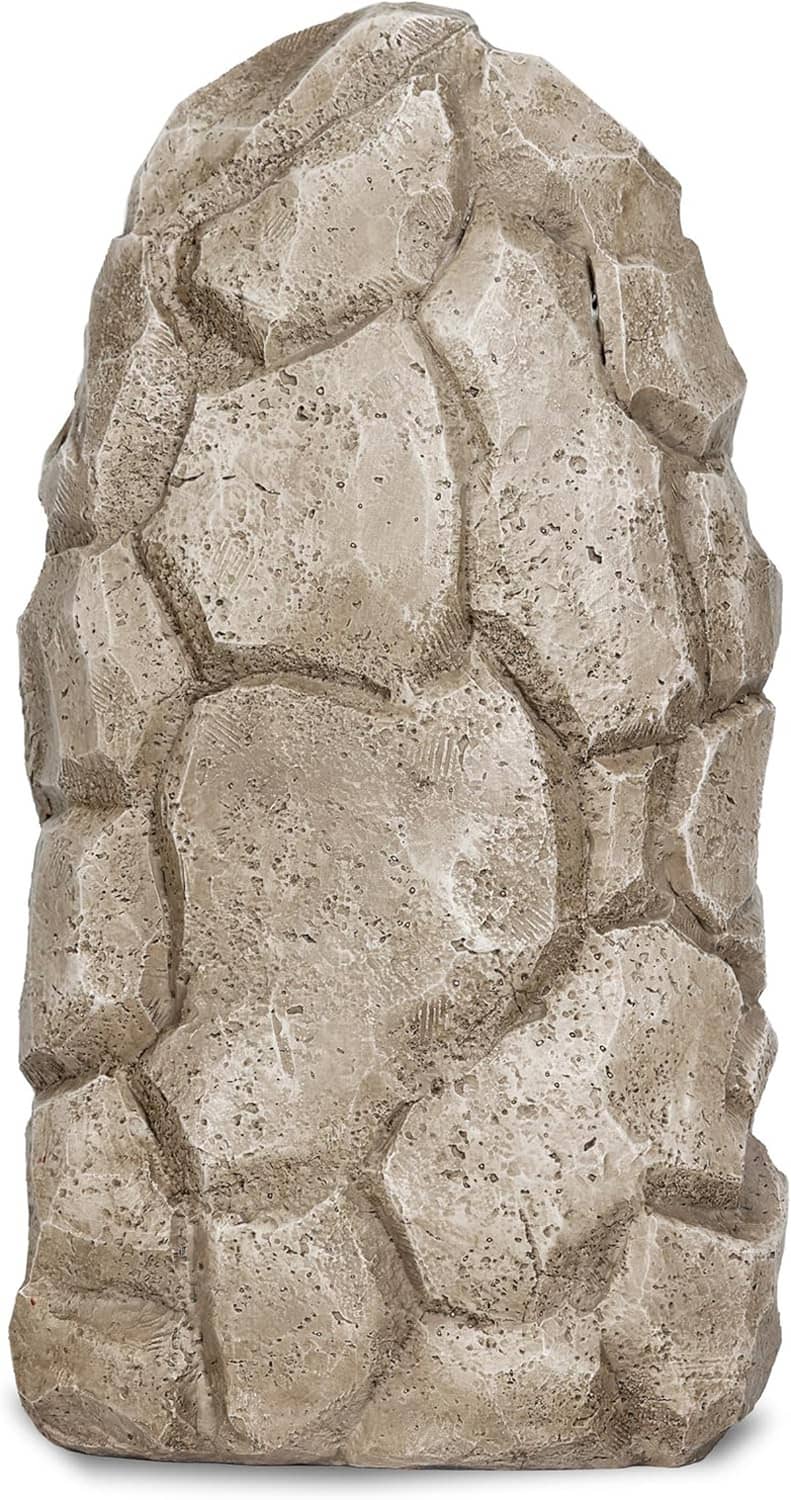 Rough gray stone statue side, carved rock pattern with shallow panel relief.
