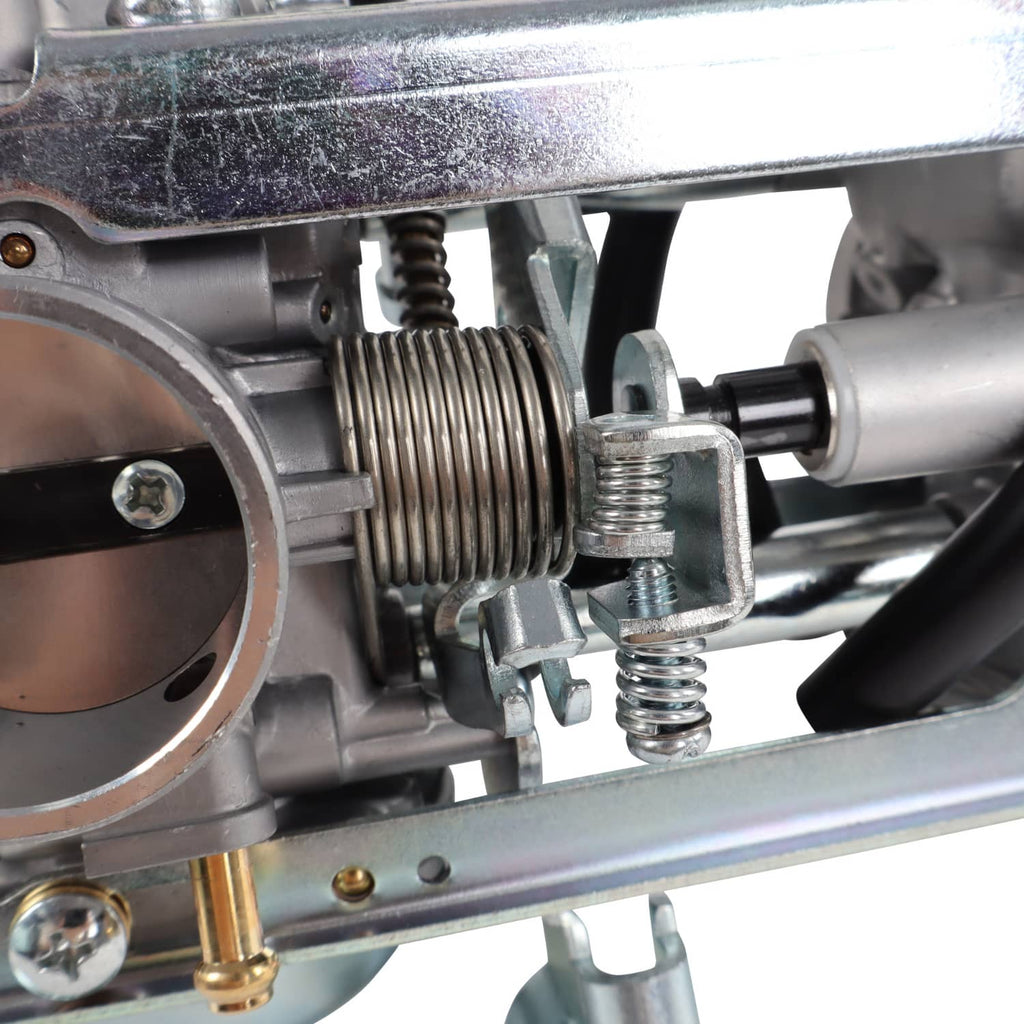 Motorcycle carburetor assembly with spring and metal linkage