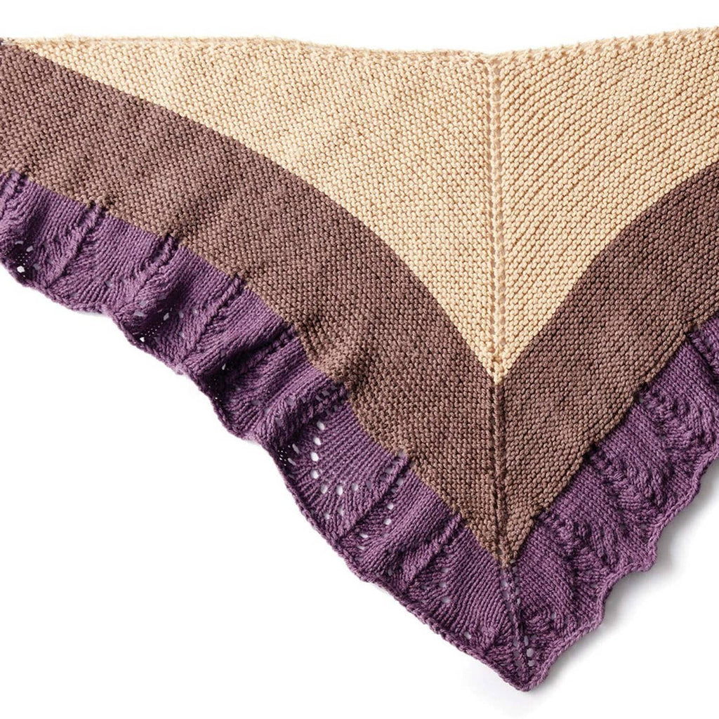 Triangular knit shawl edge with ruffled purple border and tan center panel.