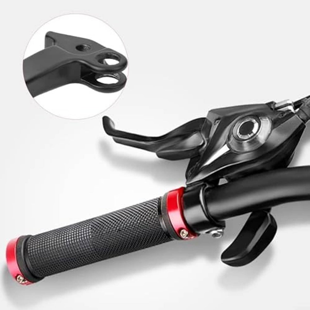 Black brake lever with metal pivot and red handlebar grip sleeve