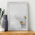 Rustic rectangular wall mirror with distressed white wood frame, slim border