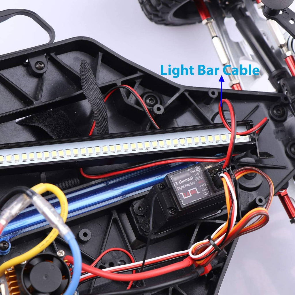 LED light bar mounted in RC chassis with wiring and light bar cable