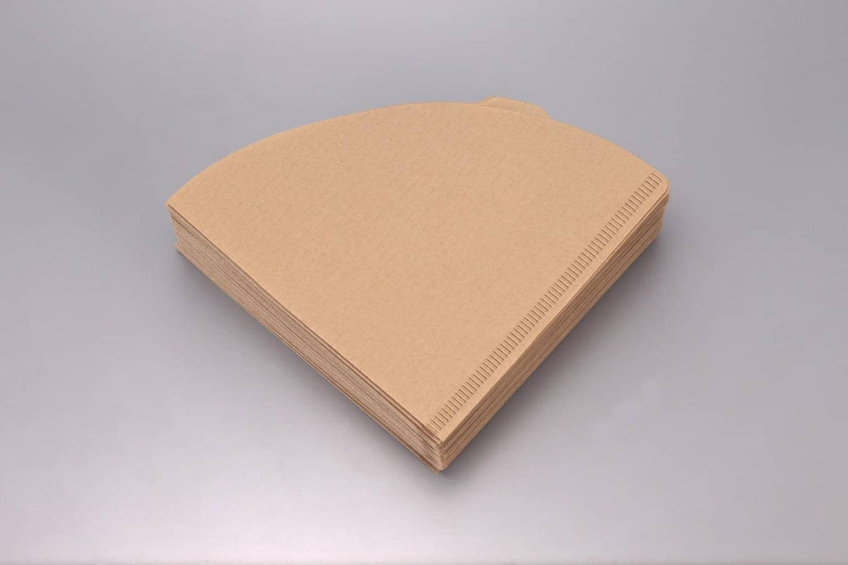 Natural paper coffee filter sheets for Hario V60 size 02, neatly stacked