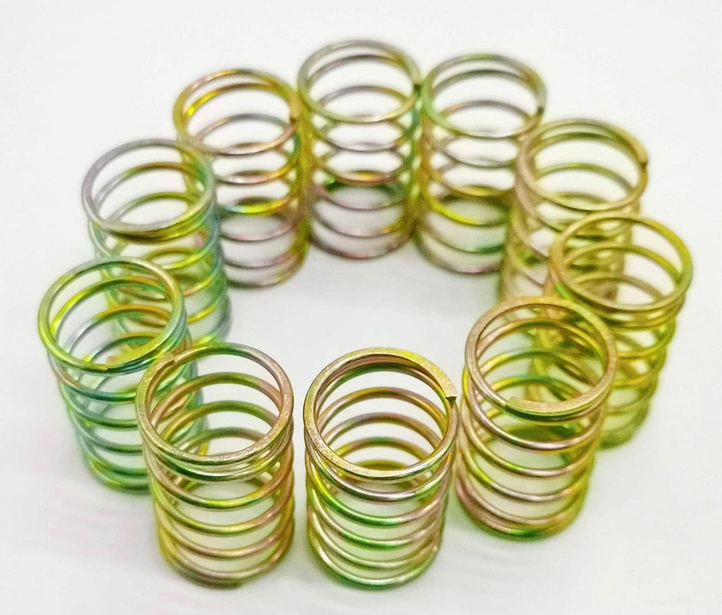 Trimmer head spring replacement set of coiled metal springs, mixed green and silver colors