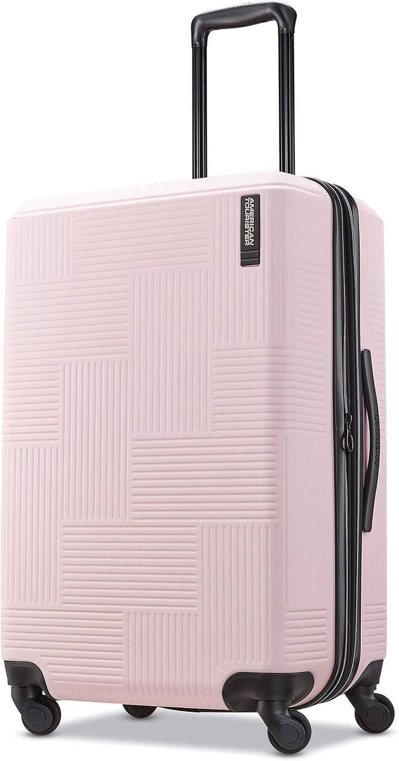 Pink blush hard-shell luggage with spinner wheels and telescoping handle