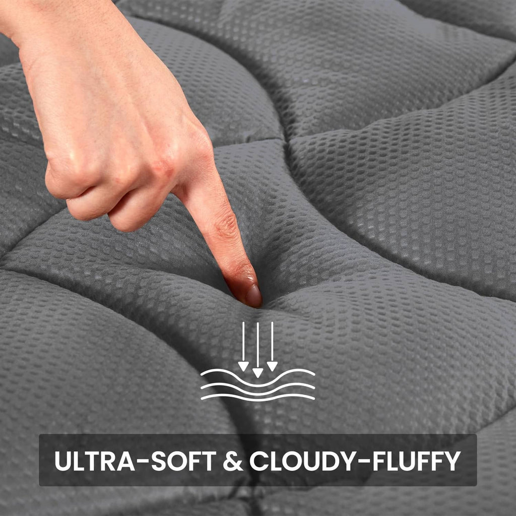 Gray mattress topper with embossed textured fabric for cushioned support