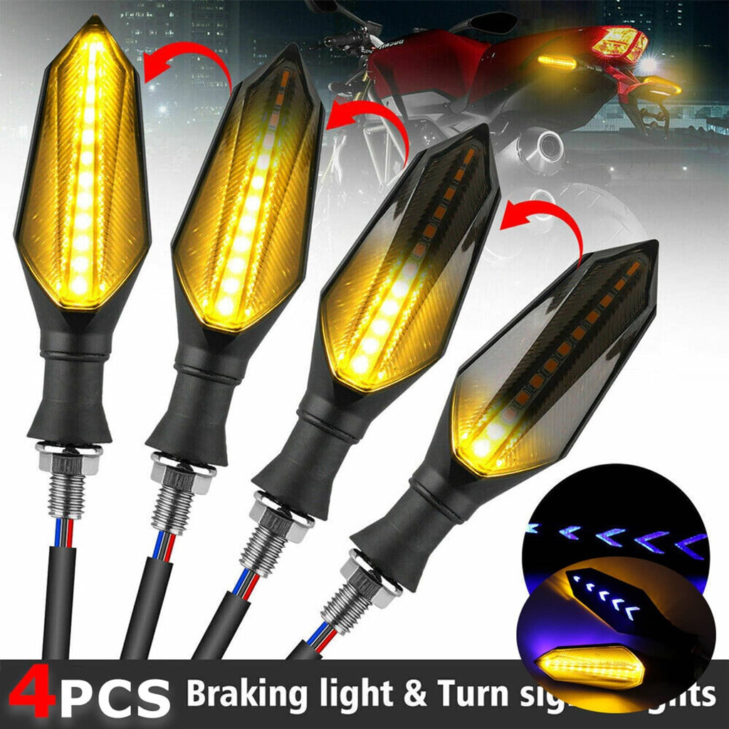 Four amber LED turn signal indicators in black housings with bright elongated light panels
