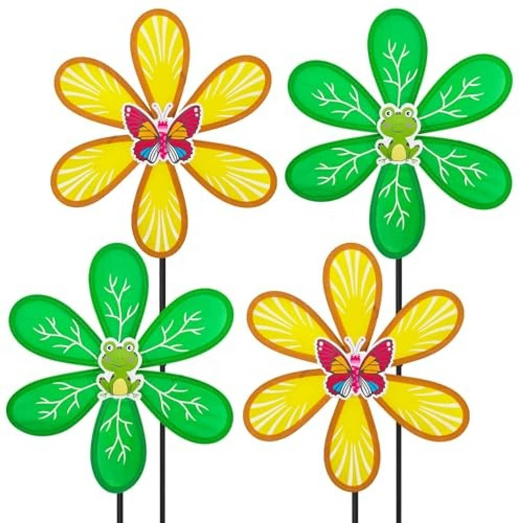 Four garden wind spinners with green leaf petals and yellow flower petals on black stakes