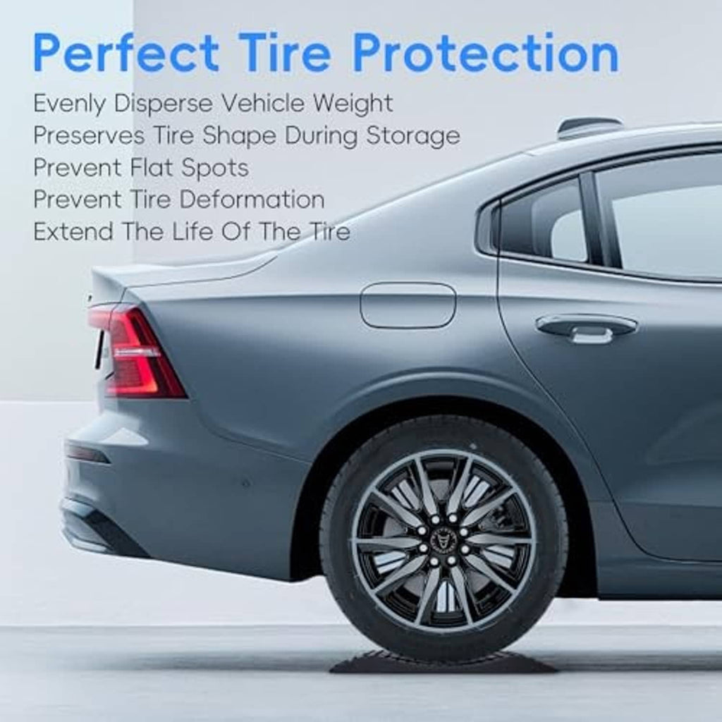 Rubber tire protection ramp under vehicle tire; textured anti-slip pad for stability.