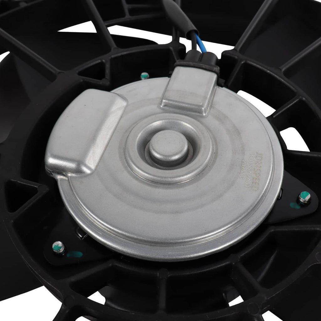 Radiator cooling fan motor cap and wiring area with metal and black housing details