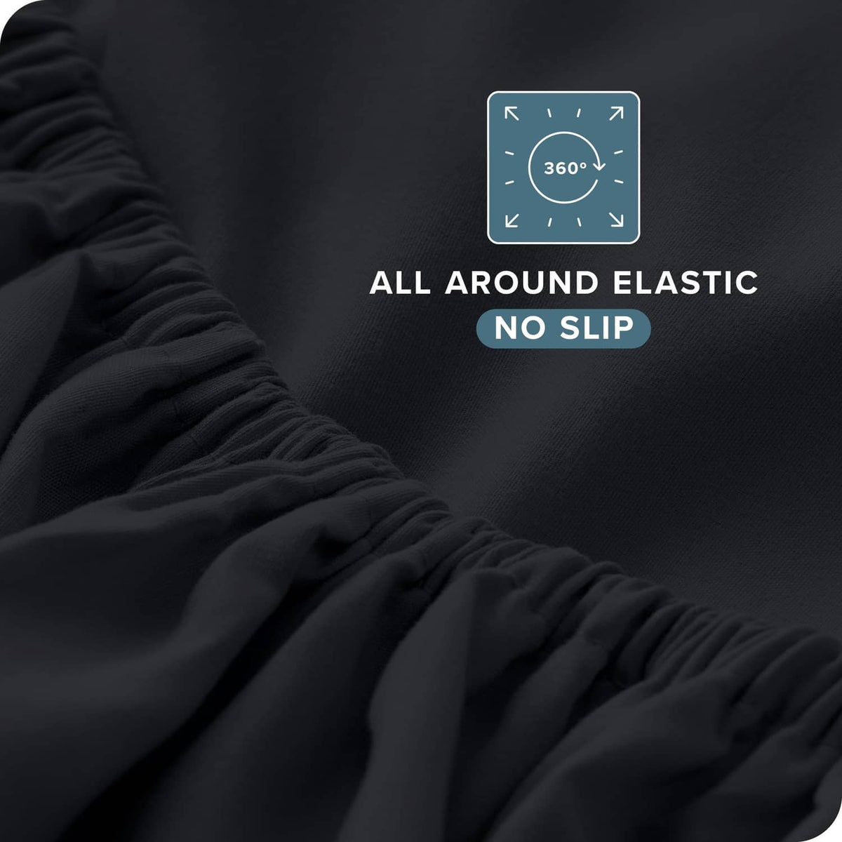 Black fitted sheet corner with gathered elastic edge, close-up fabric texture