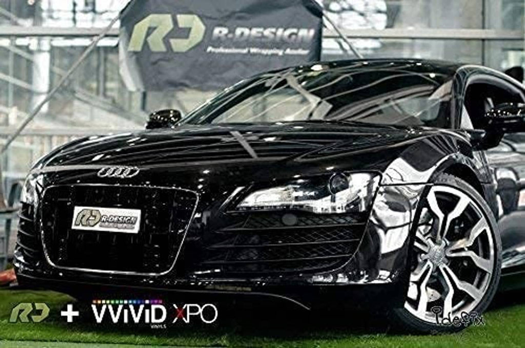 Black high-gloss vinyl-wrapped car hood and grille, glossy realistic paint-like finish