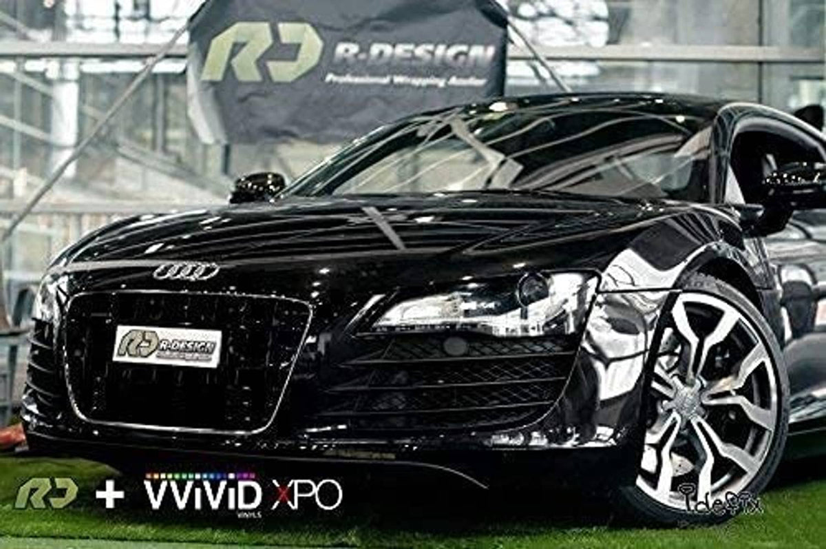Black high-gloss vinyl-wrapped car hood and grille, glossy realistic paint-like finish